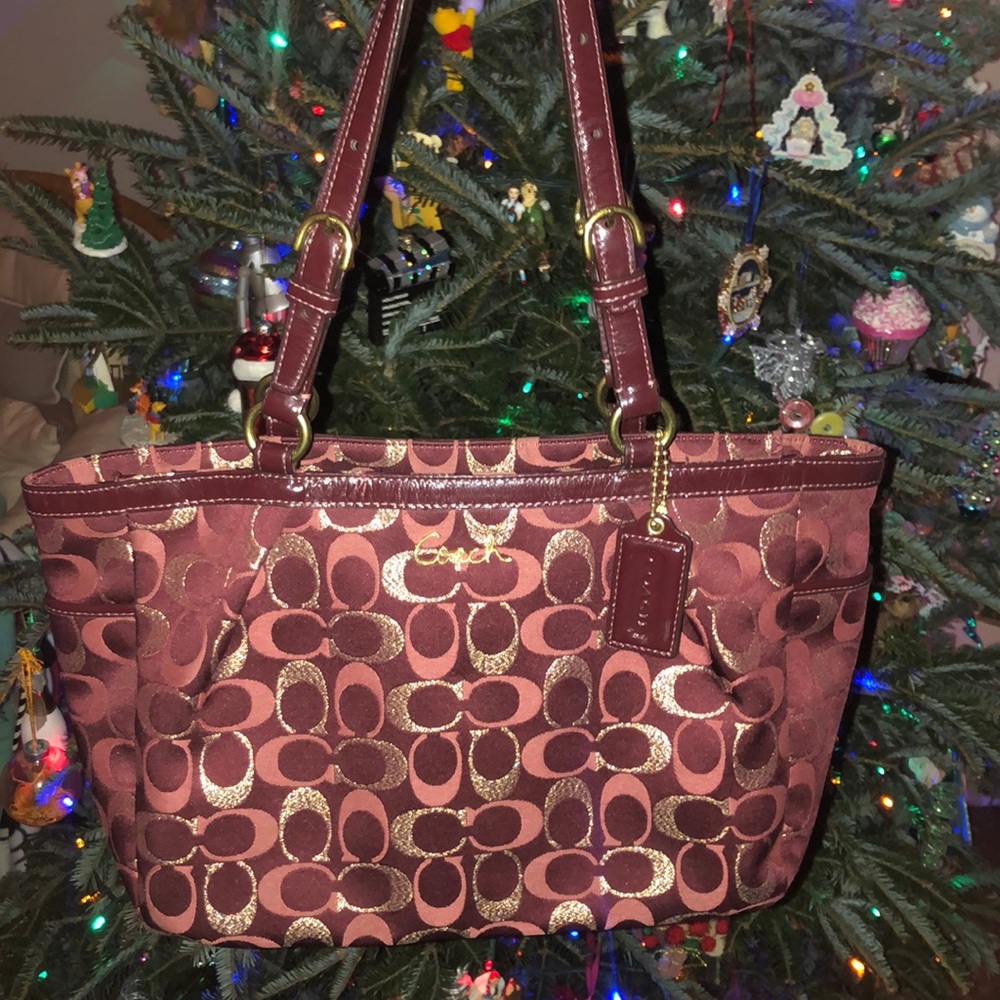 Coach cranberry and gold shoulder bag